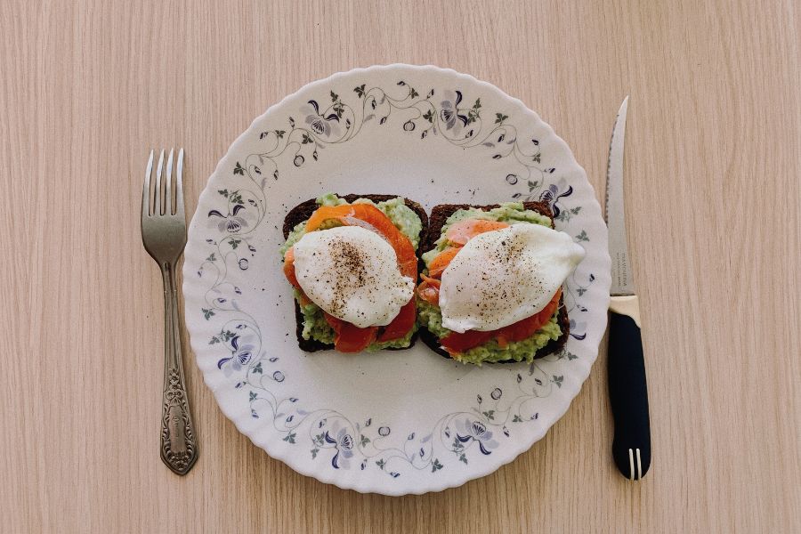 Avocado and egg toast on a plate